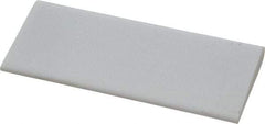 Norton - 4" Long x 1-3/4" Diam x 3/8" Thick, Novaculite Sharpening Stone - Round, Ultra Fine Grade - All Tool & Supply