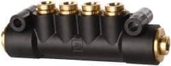 Parker - 1/4" Inlet, 1/4" Outlet Manifold - 3.98" Long x 0.9" Wide 0.21" Mount Hole, 200°F Max, 150 Max PSI, 2 Inlet Ports, 4 Outlet Ports - All Tool & Supply