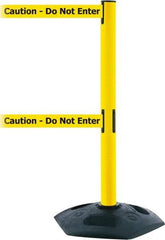 Tensator - 38" High, 2-1/2" Pole Diam, 4 Way Stanchion - 19" Base Diam, Octagon Recycled Rubber Base, Yellow Plastic Post, 13' x 2" Tape, Dual Line Tape, For Outdoor Use - All Tool & Supply