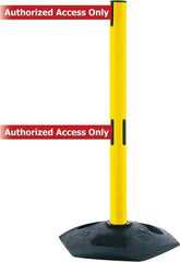 Tensator - 38" High, 2-1/2" Pole Diam, 4 Way Stanchion - 19" Base Diam, Octagon Recycled Rubber Base, Yellow Plastic Post, 7-1/2' x 2" Tape, Dual Line Tape, For Outdoor Use - All Tool & Supply