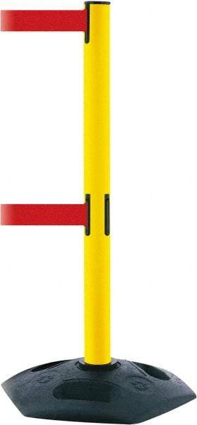 Tensator - 38" High, 2-1/2" Pole Diam, 4 Way Stanchion - 19" Base Diam, Octagon Recycled Rubber Base, Yellow Plastic Post, 7-1/2' x 2" Tape, Dual Line Tape, For Outdoor Use - All Tool & Supply