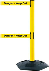 Tensator - 38" High, 2-1/2" Pole Diam, 4 Way Stanchion - 19" Base Diam, Octagon Recycled Rubber Base, Yellow Plastic Post, 13' x 2" Tape, Dual Line Tape, For Outdoor Use - All Tool & Supply