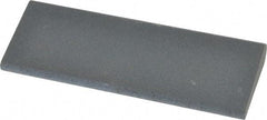 Norton - 4-1/2" Long x 1-3/4" Diam x 1/2" Thick, Silicon Carbide Sharpening Stone - Round, Fine Grade - All Tool & Supply