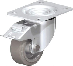 Blickle - 4" Diam x 1-37/64" Wide x 5-7/64" OAH Top Plate Mount Swivel Caster with Brake - Solid Rubber, 440 Lb Capacity, Ball Bearing, 5-1/2 x 4-3/8" Plate - All Tool & Supply