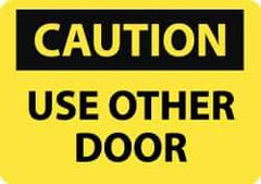 NMC - Caution - Use Other Door, Pressure Sensitive Vinyl Fire and Exit Sign - 14" Wide x 10" High - All Tool & Supply